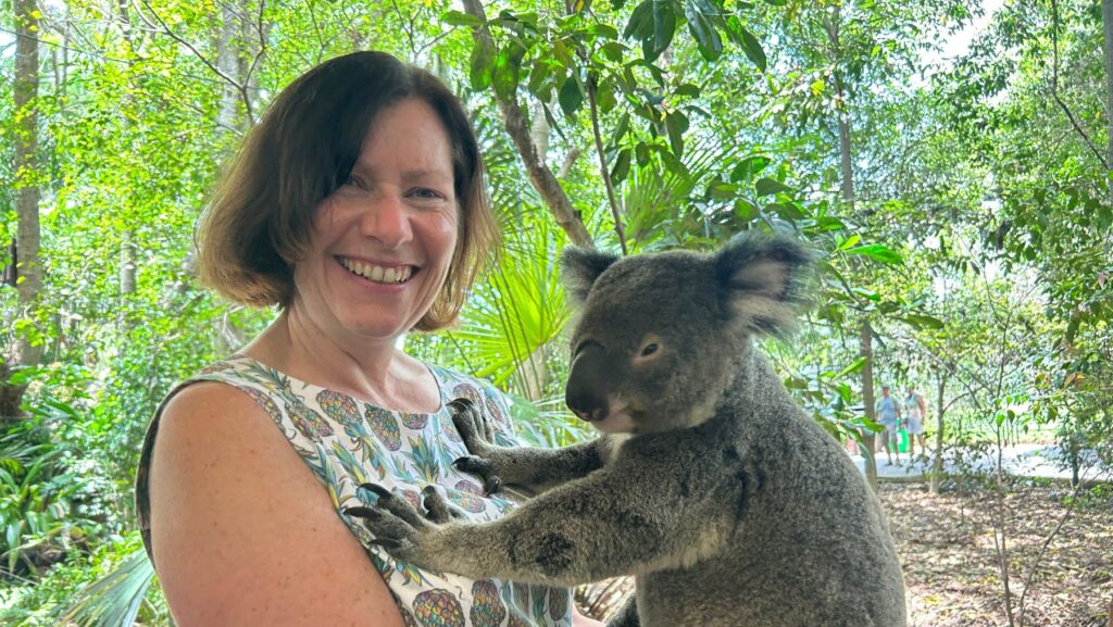 TechHer founder Jane Pitt holding a Koala in Australia